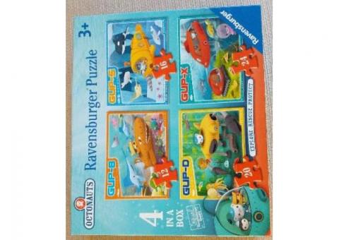 Ravensburger puzzles a box of 4 jigsaws