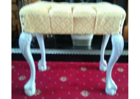 Carved legged stool, with fabric seat.